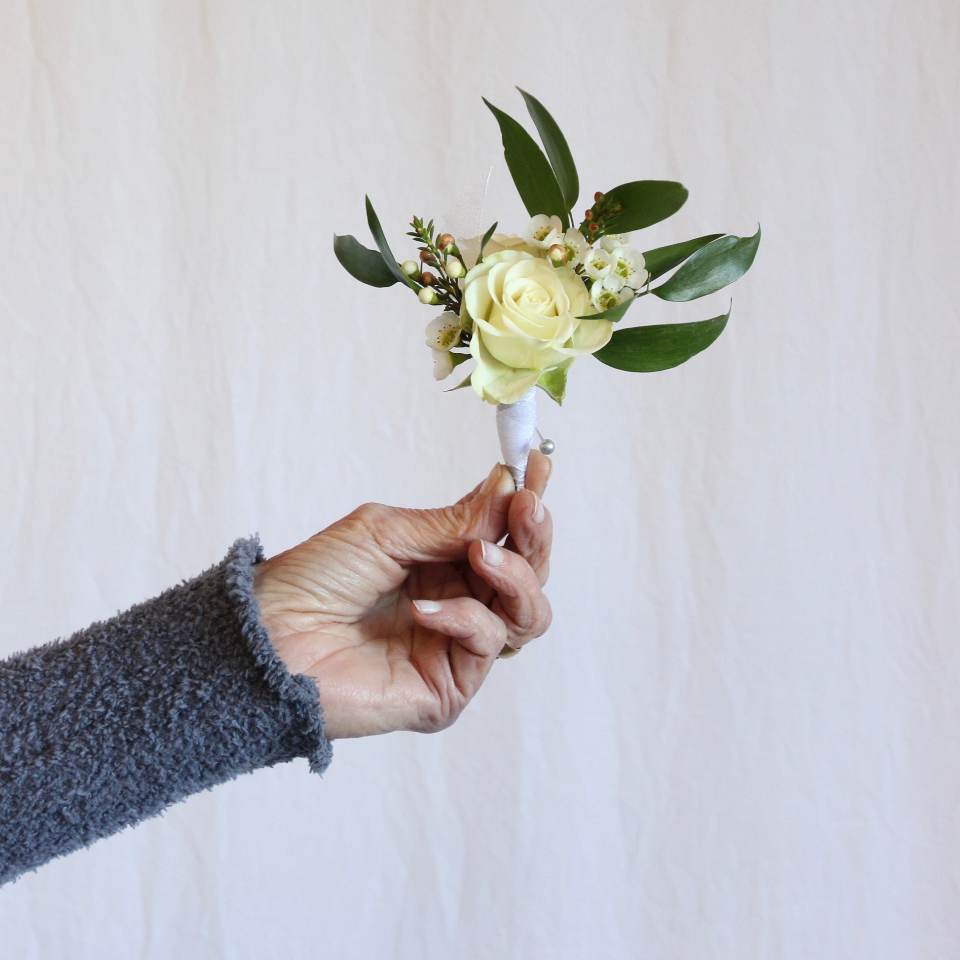 air plant boutonniere Boutonniere – The Flower Shop