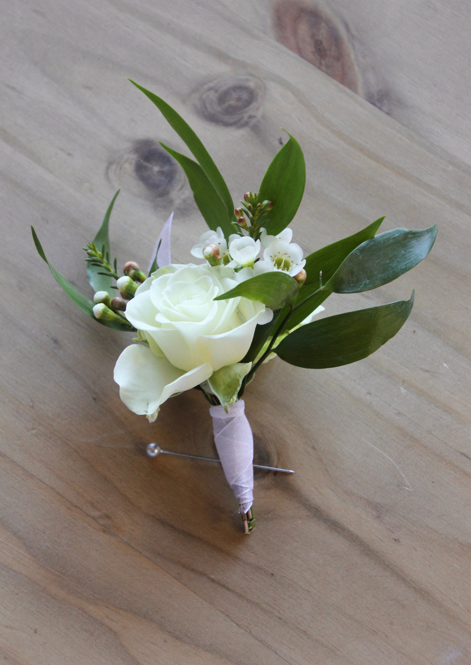 air plant boutonniere Boutonniere – The Flower Shop